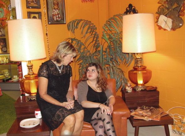 Tricia Bohlen and associate enjoying a 60's style living room.