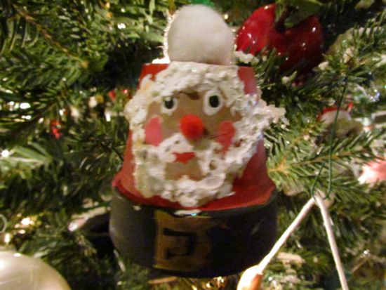 Aaron's handmade Santa out of a clay pot.