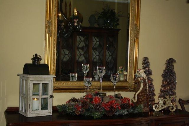 The buffet with gilded mirror.