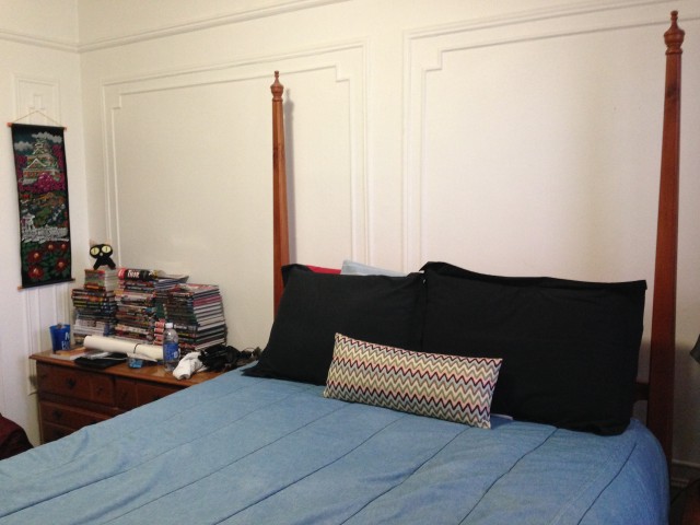 Blank wall before. (Books on dresser were temporary prior to moving a bookcase.)