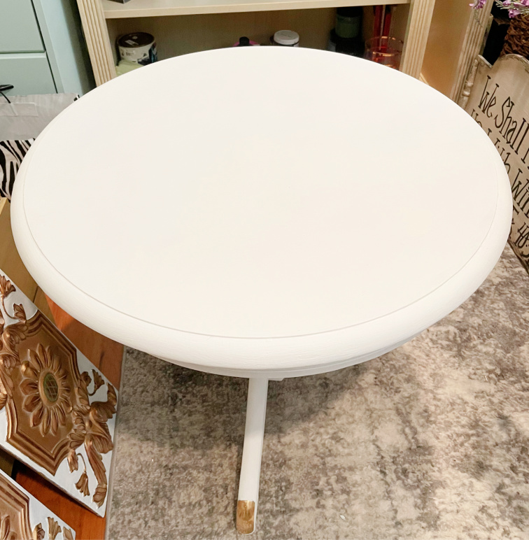 small round painted side table